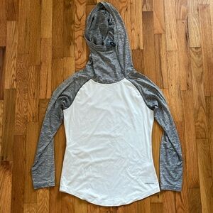 Patagonia long-sleeved sun-shirt with hood. Friend gifted and it is too small.